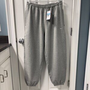 NWT Nike Solo Swoosh Cuffed Fleece Lined Athletic Pants Size Medium
